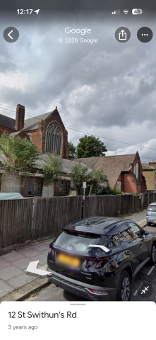 Entrance to meeting is rear of the church, off the main road