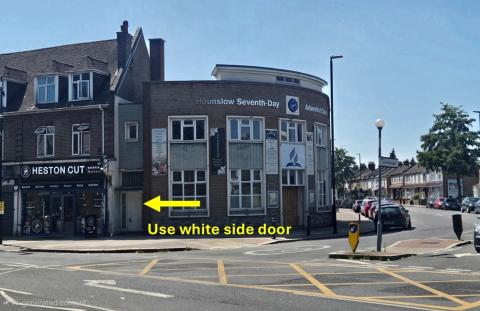 Side Door for entry - white door to the left.